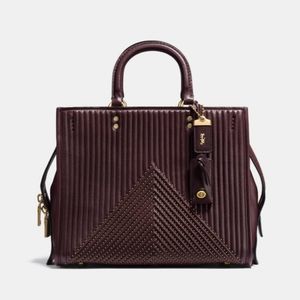 NWT Rare Quilted Oxblood Coach Rogue bag